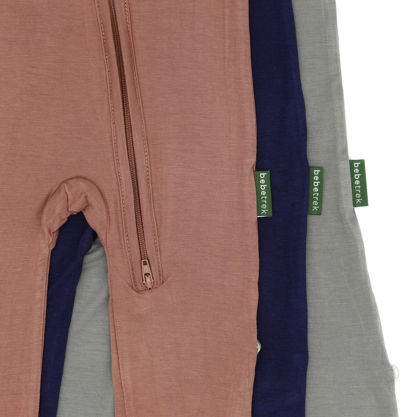 Bebe Trek UV protective sun suits in three colours, dusty rose, navy blue and earth grey